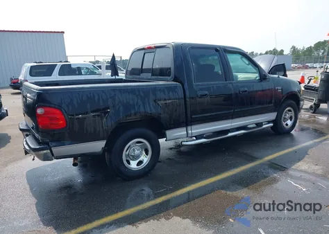 2002 Ford F-150 Lariat/Xlt z USA, uszkodzony, nr VIN 1FTRW07L42KD74947